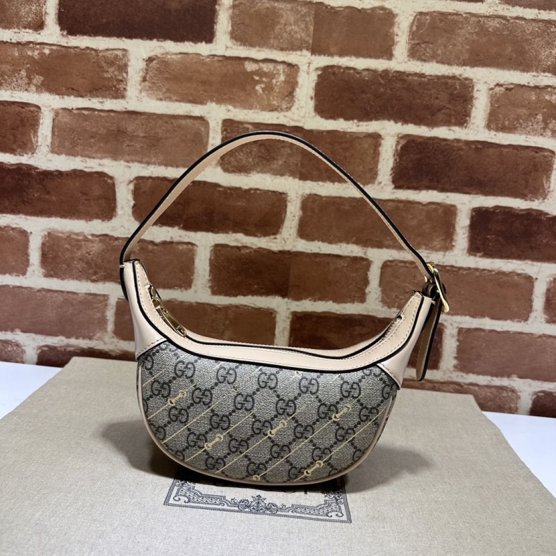 G*u*i top handle bags